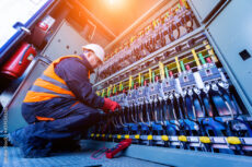 Checking the operating voltage levels of the solar panel switchgear compartment